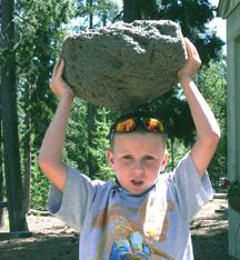 Kyle showing his great strength in lifting mighty pumice boulder